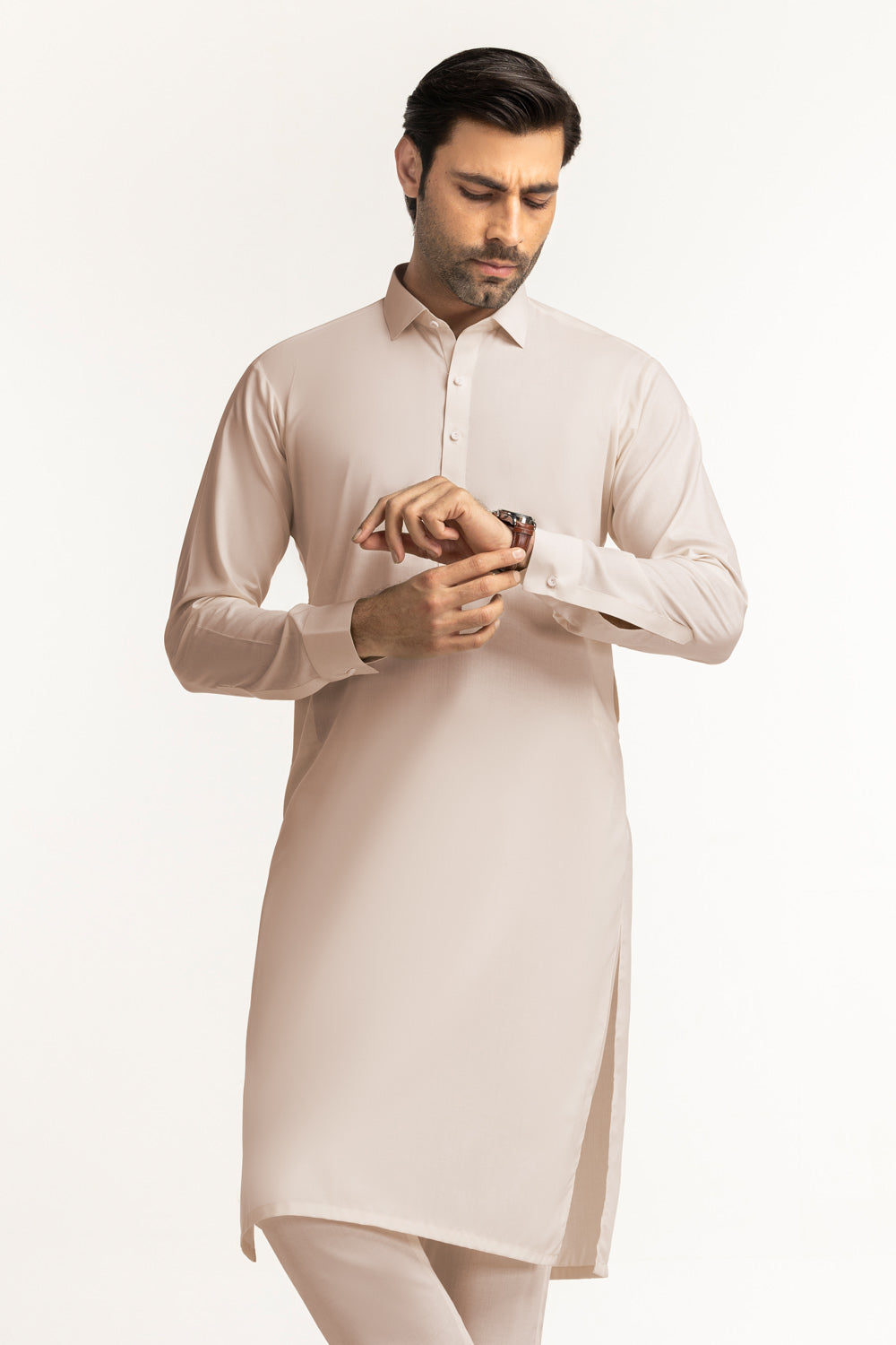 https://cdn.shopify.com/s/files/1/0706/3253/8159/files/essenza-f-unstitched-fabric-washnwear-light-peach-midshot-front.jpg?v=1767792109