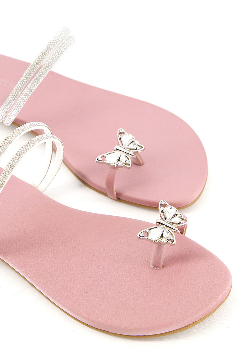 https://cdn.shopify.com/s/files/1/0178/4492/8612/files/footwear_0000_CROSS-STITCH-001-PINK_slides_jpg_1.jpg?v=1758183660