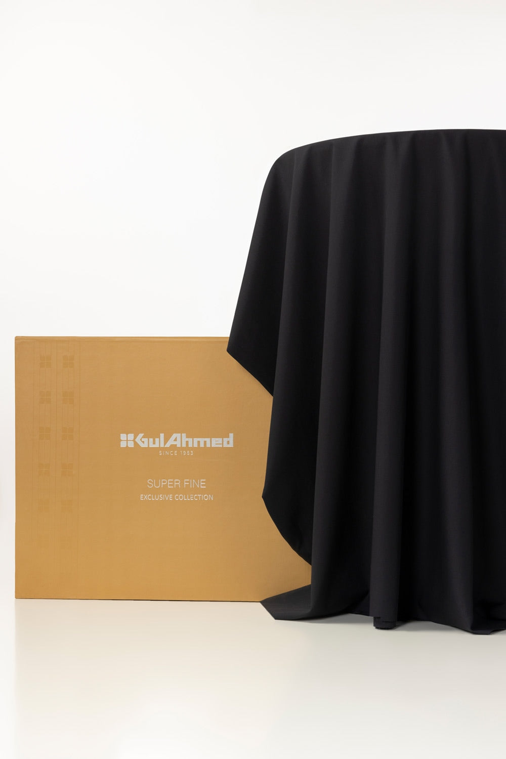 https://cdn.shopify.com/s/files/1/0706/3253/8159/files/gini_gold_unstitched_fabric_blended_with_gift_box-dark_grey_1.jpg?v=1758383513
