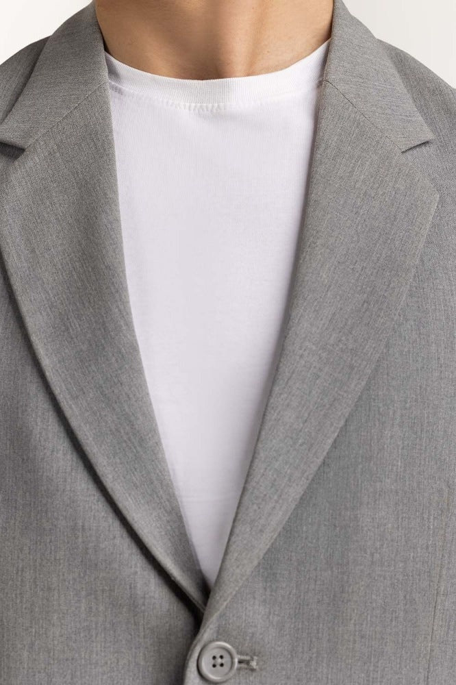 https://cdn.shopify.com/s/files/1/0706/3253/8159/files/grey_formal_blazer_blazer_mn-blz-ws23-002_1.jpg?v=1758455159