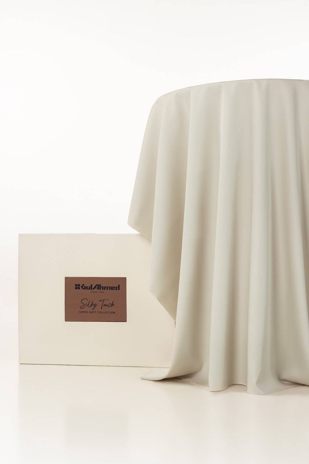 https://cdn.shopify.com/s/files/1/0706/3253/8159/files/hitex_satin_classic_plus_unstitched_fabric_cotton_with_gift_box-light_grape_2.jpg?v=1758383427