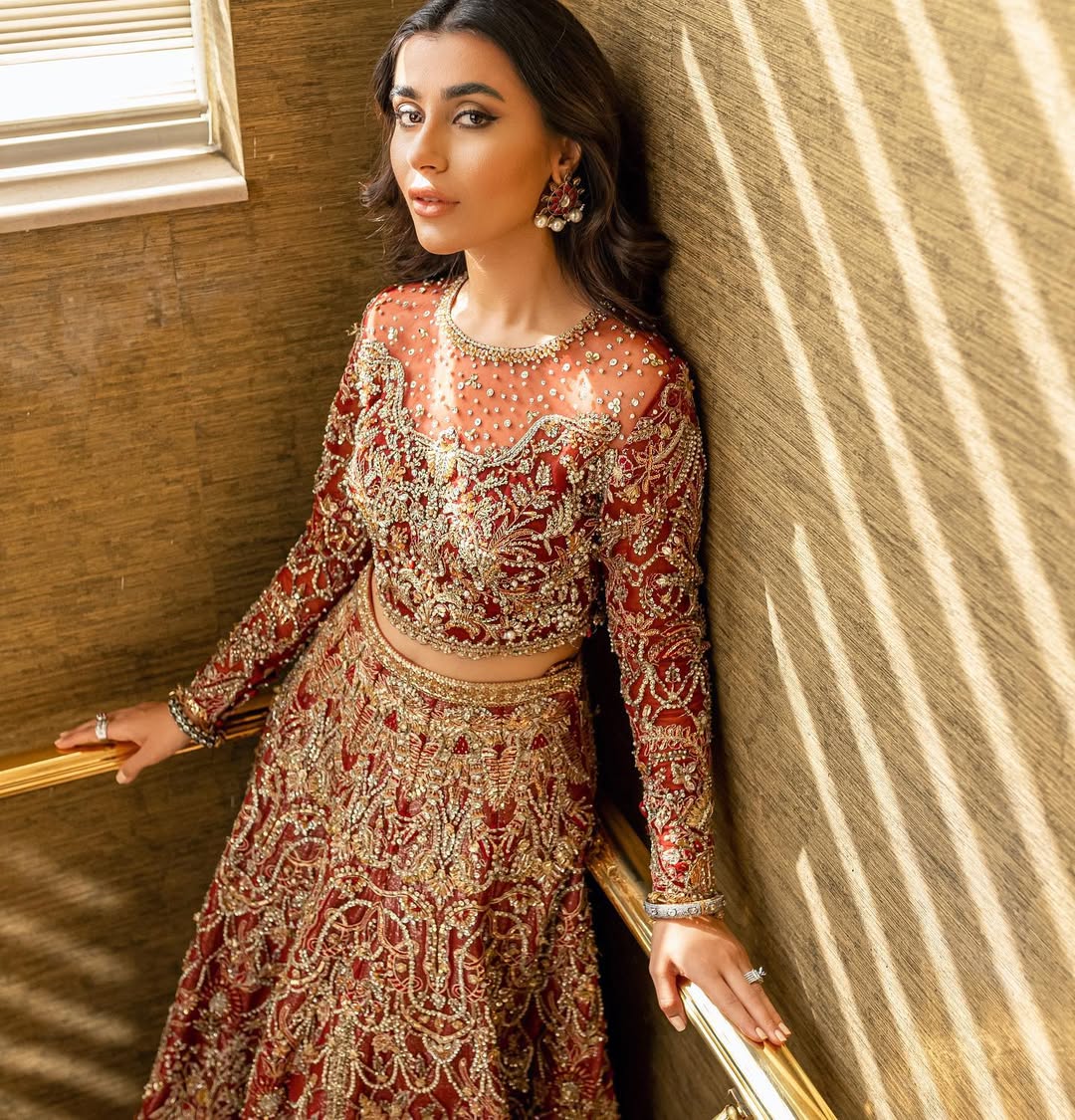 https://cdn.shopify.com/s/files/1/0523/4327/5696/files/nora-deep-red-bridal-lehnga-mysie-2.jpg?v=1757924251