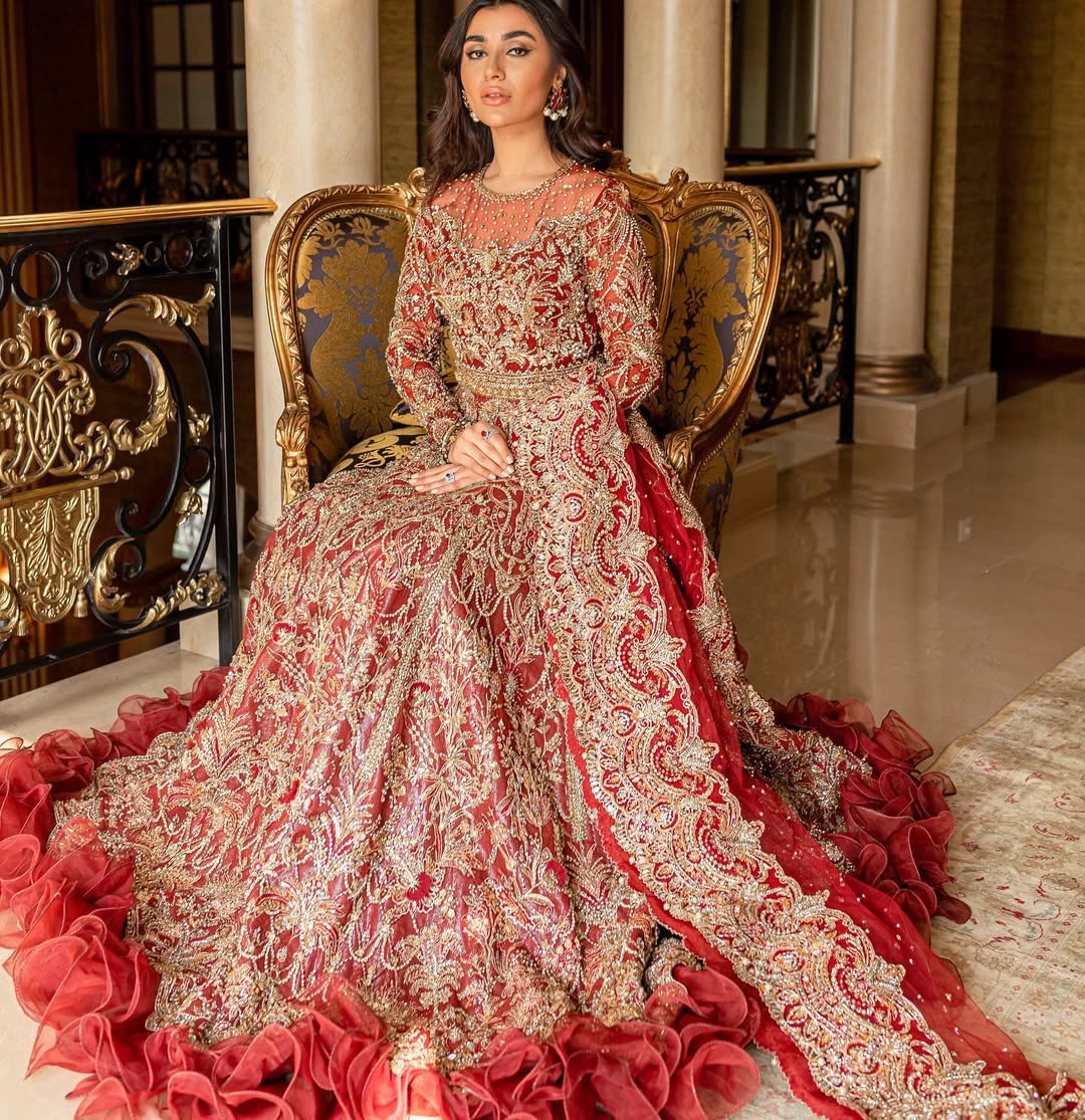 https://cdn.shopify.com/s/files/1/0523/4327/5696/files/nora-deep-red-bridal-lehnga-mysie-4.jpg?v=1757924251
