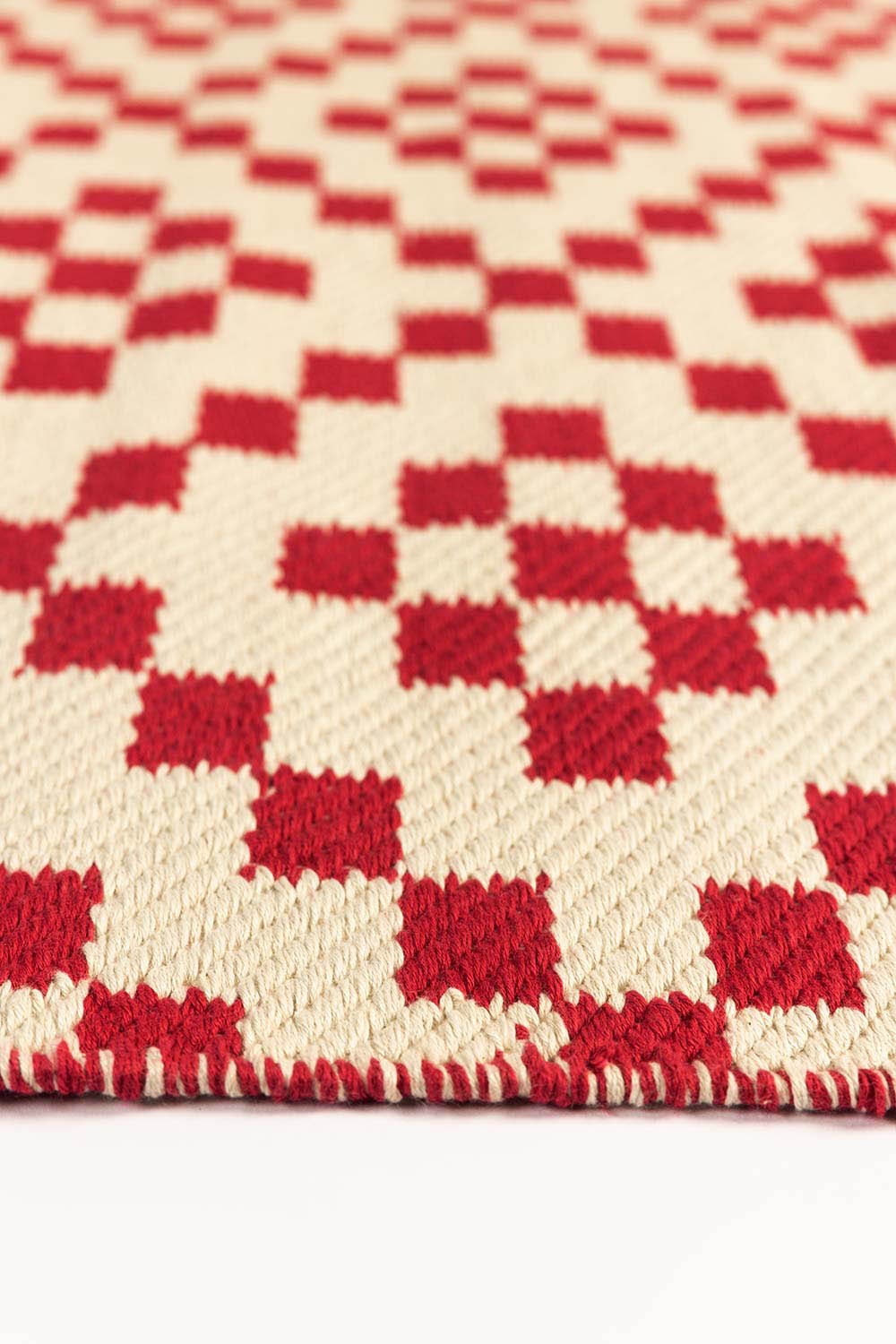 https://cdn.shopify.com/s/files/1/0706/3253/8159/files/quadra_yarn_dyed_rug_3.jpg?v=1758373716