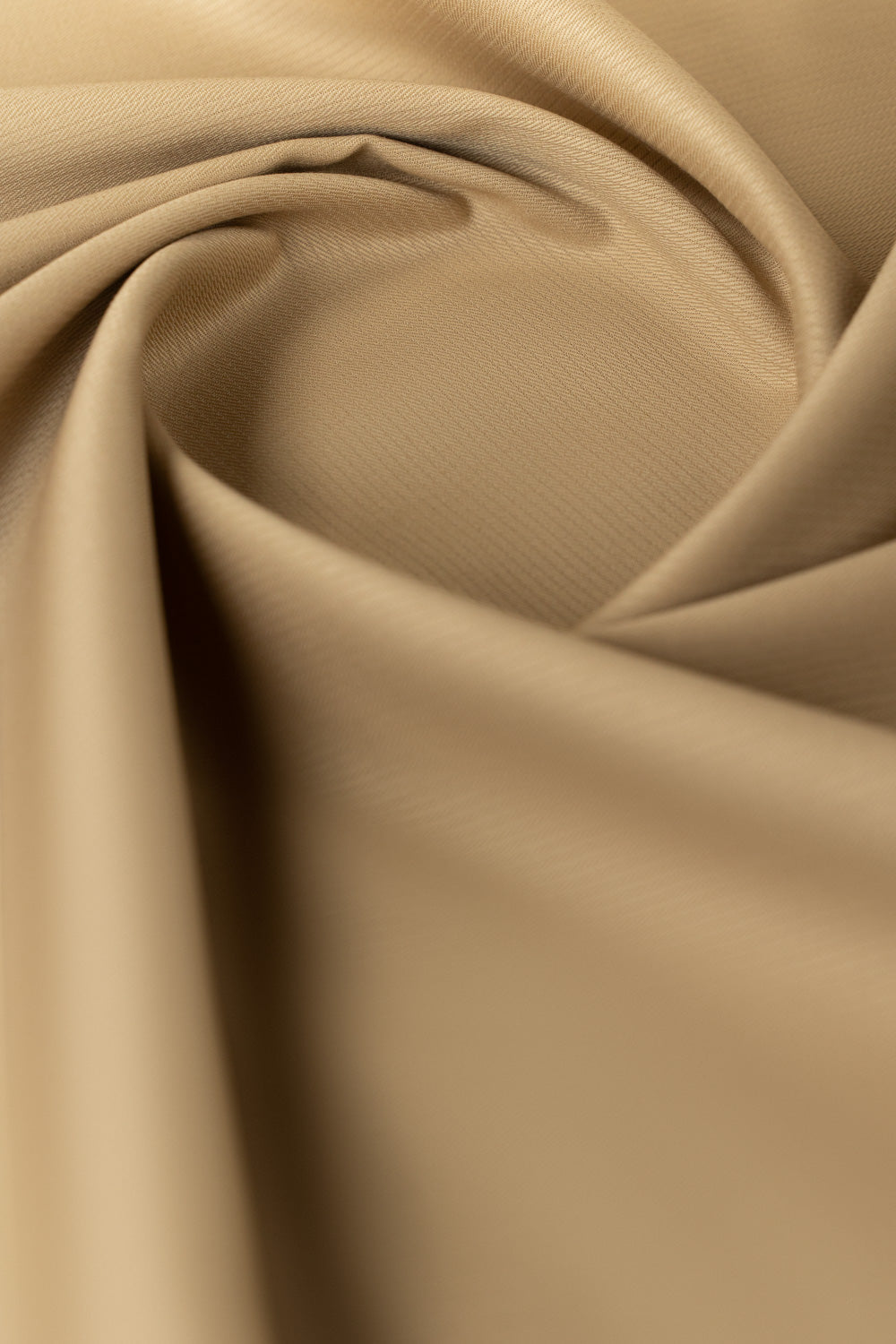 https://cdn.shopify.com/s/files/1/0706/3253/8159/files/tanabana-royal-hmb-03-unstitched-fabric-cotton-khaki-closeshot-side1.jpg?v=1774441051
