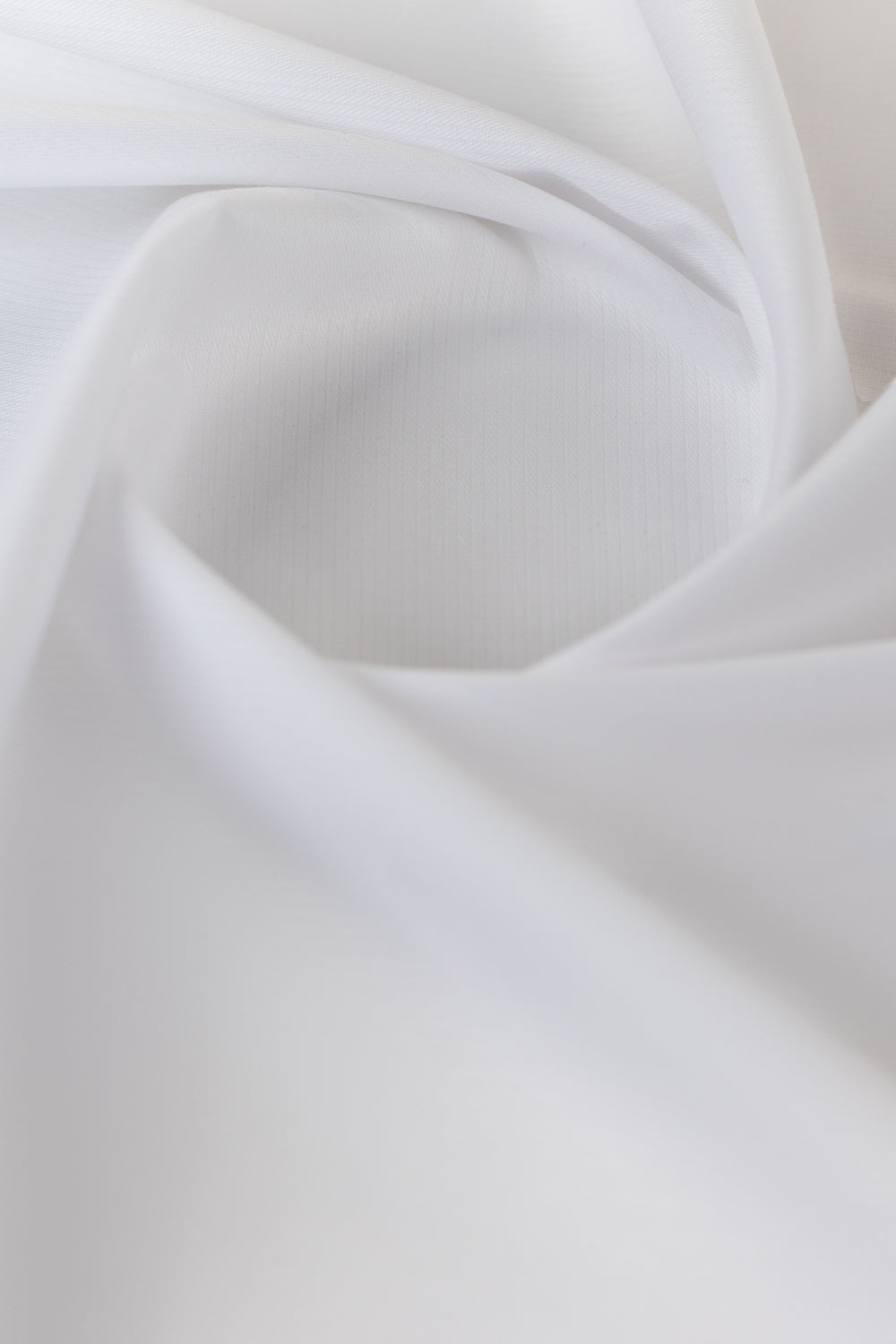 https://cdn.shopify.com/s/files/1/0706/3253/8159/files/tanabana-royal-hmb-03-unstitched-fabric-cotton-white-closeshot-side1.jpg?v=1774441001