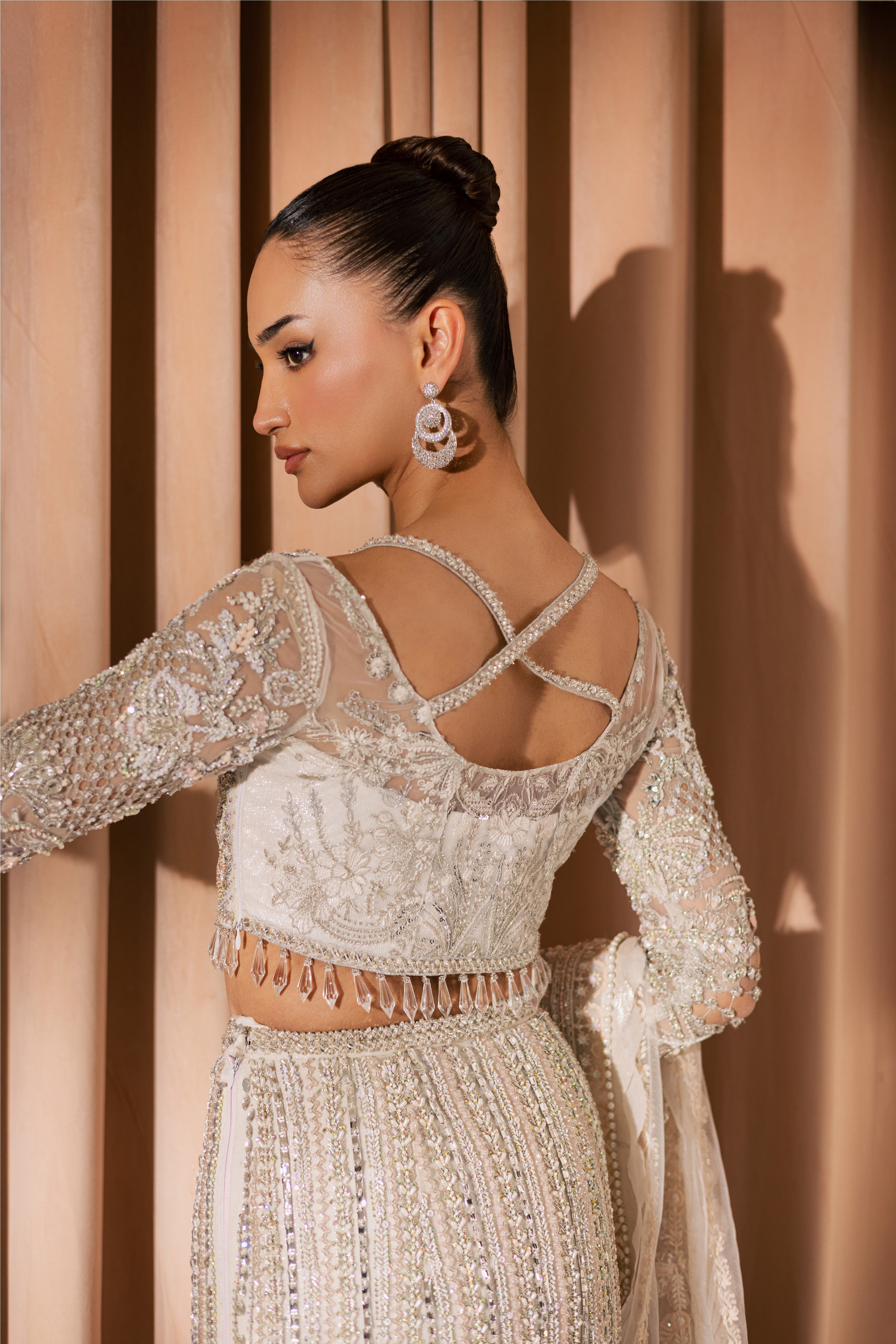 https://cdn.shopify.com/s/files/1/0523/4327/5696/files/vanya-white-bridal-lehenga-mysie-8.jpg?v=1762330716