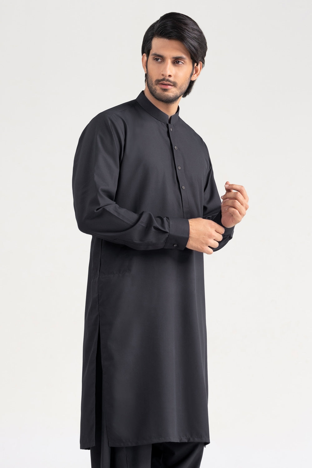 https://cdn.shopify.com/s/files/1/0706/3253/8159/files/vision-mirage-co-unstitched-fabric-washnwear-dark-grey-midshot-side1.jpg?v=1758383635